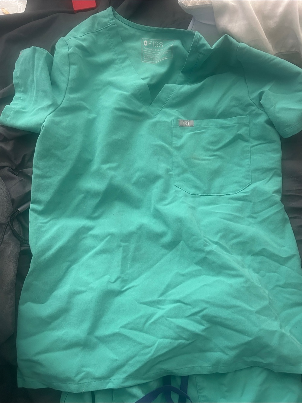 FIGS Women’s Catarina Teal V-Neck Scrub Top with Chest Pocket